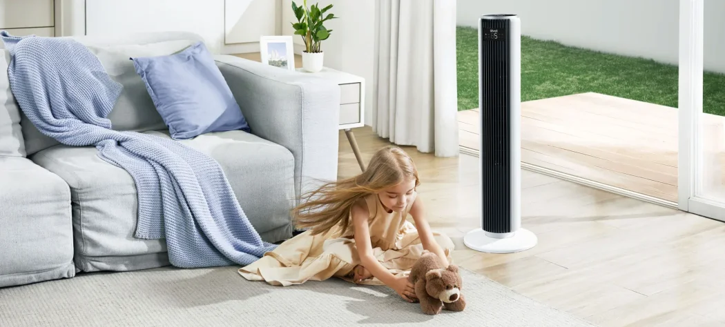 LEVOIT 36 inch white tower fan in a living room